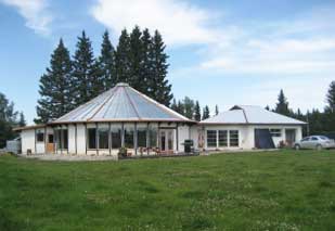 StrawbailHouse round straw bale house